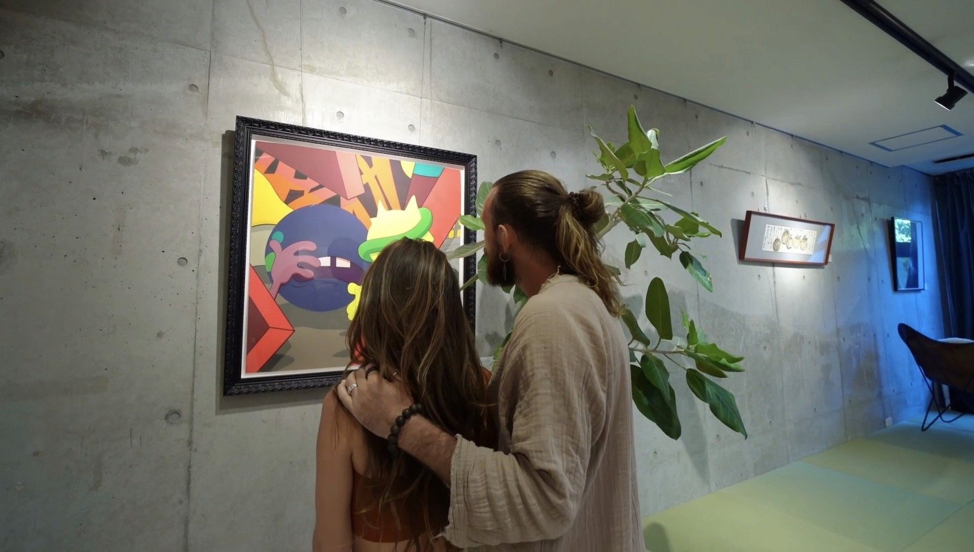Guests viewing curated artwork