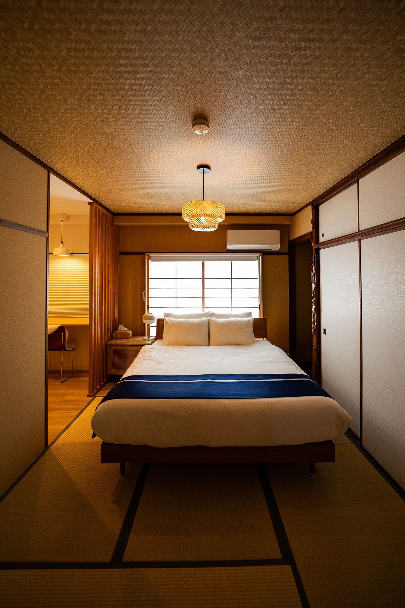 Tatami bedroom with a paper lantern and shoji screen
